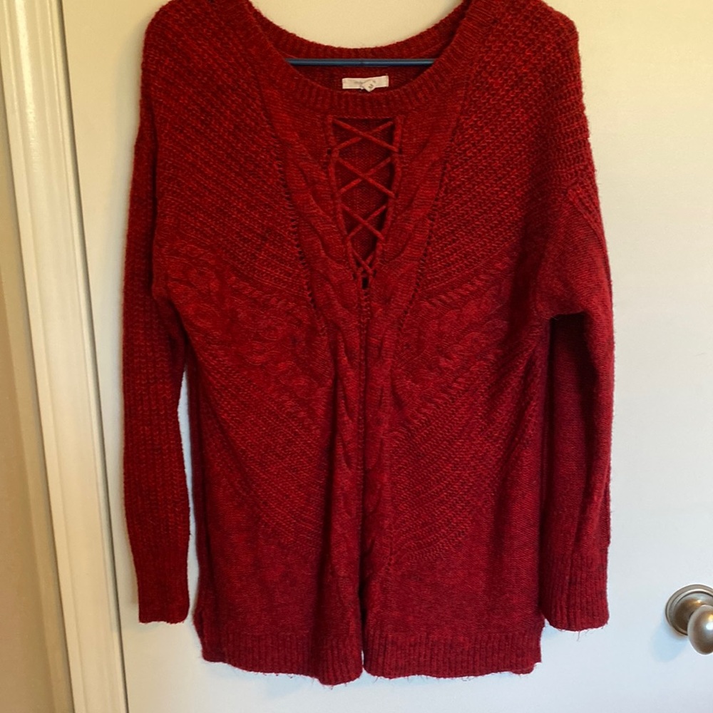 Ruby red sweater.
